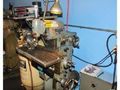 Morris Taper 4 spindle / The dividing head is not included, though it can be added for additional cost ($500.00)  The DRO is two axis. EQUIPPED WITH X & Y POWER FEED, ACURITE DRO, COOLANT PUMP, VISE, COLLETS, MANUALS