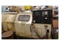 EQUIPPED WITH 4-AXIS, 22X60, FANUC 11TT, 4' SPINDLE HOLE, 15" CHUCK, COLLET HEAD, 60 HP, 3200 RPM, UNDER POWER & RUNNING