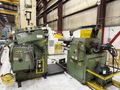 15,000 lbs. x 24" wide Feed Lease Coil Reel with Feed Lease Powered Straightener For Sale - Mode