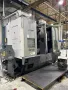 Okuma 2SP-V60 Twin Spindle CNC Vertical Turret Lathe. 24" Chucks. New-2006