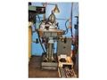 Morris Taper 4 spindle / The dividing head is not included, though it can be added for additional cost ($500.00)  The DRO is two axis. EQUIPPED WITH X & Y POWER FEED, ACURITE DRO, COOLANT PUMP, VISE, COLLETS, MANUALS