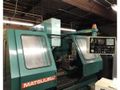 EQUIPPED WITH YASNAC MX-3, FULL 4TH AXIS, LIVE CENTER, 30 ATC, INCLUDES 55 BT-40 TOOL HOLERS, RIGID TAPPING, NEW SPINDLE DRIVE, VERY CLEAN, UNDER POWER & RUNNING