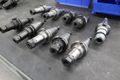CT40 Taper Tool Holders: (9) Er20 Collet Holders, (1) Nikken SKN-16B Collet Holder- Auction Item