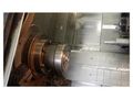 EQUIPPED WITH 4-AXIS, 22X60, FANUC 11TT, 4' SPINDLE HOLE, 15" CHUCK, COLLET HEAD, 60 HP, 3200 RPM, UNDER POWER & RUNNING