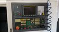 Specifications:  NC Controller: Fanuc Oi-TB Spindle Motor: 11 HP Max Spindle Speed: 3,500 RPM Taper: MT#4  Chucksize: 10" Turning Diameter: 13.79"  Machining Length: 24.80" Number of tool station: 10 Rapid Speed (X / Z) mm/min: 30/30 Max. Stroke  (X