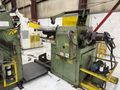 15,000 lbs. x 24" wide Feed Lease Coil Reel with Feed Lease Powered Straightener For Sale - Mode