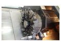 EQUIPPED WITH 4-AXIS, 22X60, FANUC 11TT, 4' SPINDLE HOLE, 15" CHUCK, COLLET HEAD, 60 HP, 3200 RPM, UNDER POWER & RUNNING
