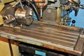 Morris Taper 4 spindle / The dividing head is not included, though it can be added for additional cost ($500.00)  The DRO is two axis. EQUIPPED WITH X & Y POWER FEED, ACURITE DRO, COOLANT PUMP, VISE, COLLETS, MANUALS