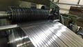 26" x.105" x 20,000# Ruesch Slitting Line with Slip Core Drum