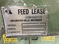 15,000 lbs. x 24" wide Feed Lease Coil Reel with Feed Lease Powered Straightener For Sale - Mode