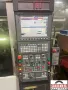 OKUMA 2SP-150H - Horizontal Lathe