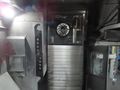 Haas EC-1600 CNC Horizontal Machining Center with Integrated 4th axis Rotary Table, 5th Axis Drive, Probing, and Thru-Spindle Coolant