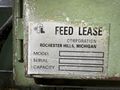 15,000 lbs. x 24" wide Feed Lease Coil Reel with Feed Lease Powered Straightener For Sale - Mode