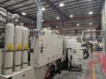 650 TON KRAUSS MAFFEI CXZL 650-3000/1400/750  THREE SHOT INJECTION MOLDING MACHINE, 2010