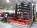 Amada high production punching system with 6 shelf load system and 5 shelf unload with part stacking for unmanned operation with job scheduling