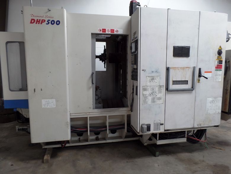 Model DHP-500 Year of manufacture 2001  CNC control Fanuc 16iM,  Main motor/15 min. 40/33 hp.  Spindle speed 600-12,000 rpm  Tool shank Cat 50  Tool stations 60 stations  Pallet size 19.68” x 19.68” American standard  Number of pallets Two  X-axis 3