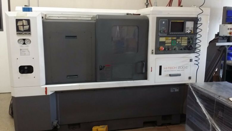 Specifications:  NC Controller: Fanuc Oi-TB Spindle Motor: 11 HP Max Spindle Speed: 3,500 RPM Taper: MT#4  Chucksize: 10" Turning Diameter: 13.79"  Machining Length: 24.80" Number of tool station: 10 Rapid Speed (X / Z) mm/min: 30/30 Max. Stroke  (X
