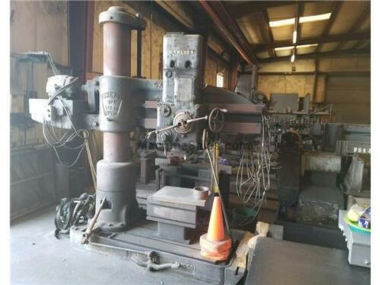 Arm length: 4'     Column diameter: 13"    INCLUDES TABLE, UNDER POWER & RUNNING