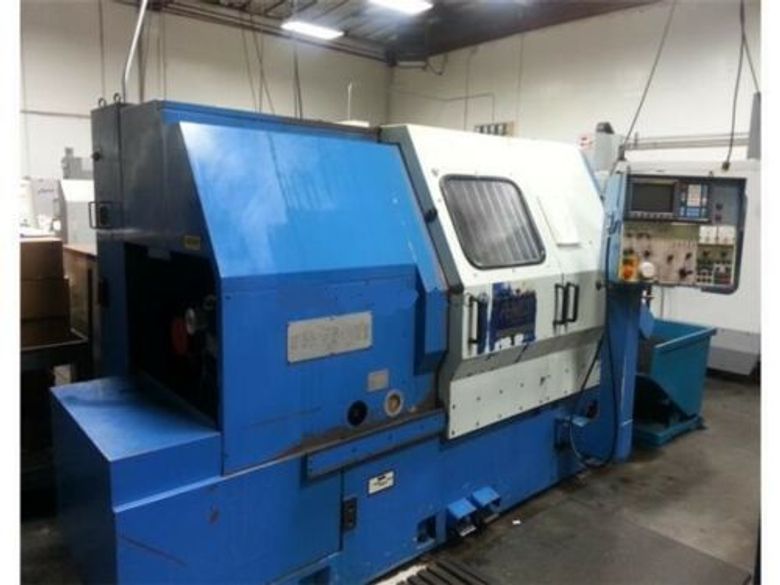 FANUC OT CONTROL, 25 HP, 4000 RPM, 10" CHUCK, 21"X24" TAILSTOCK, UNDER POWER & RUNNING