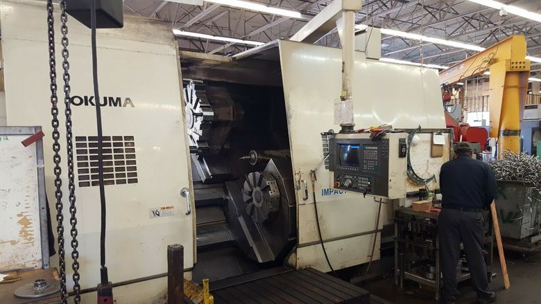 Model Okuma LU-45 25C x 1500 OSP7000L Control 21 Inch Chuck Conveyor