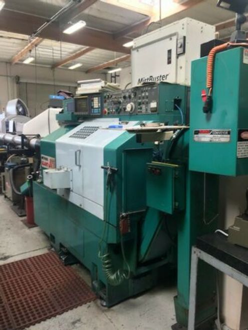 1988 Nakamura Tome Slant JR S-JR Fanuc OT Conveyor w LNS Bar Feed 10ATC