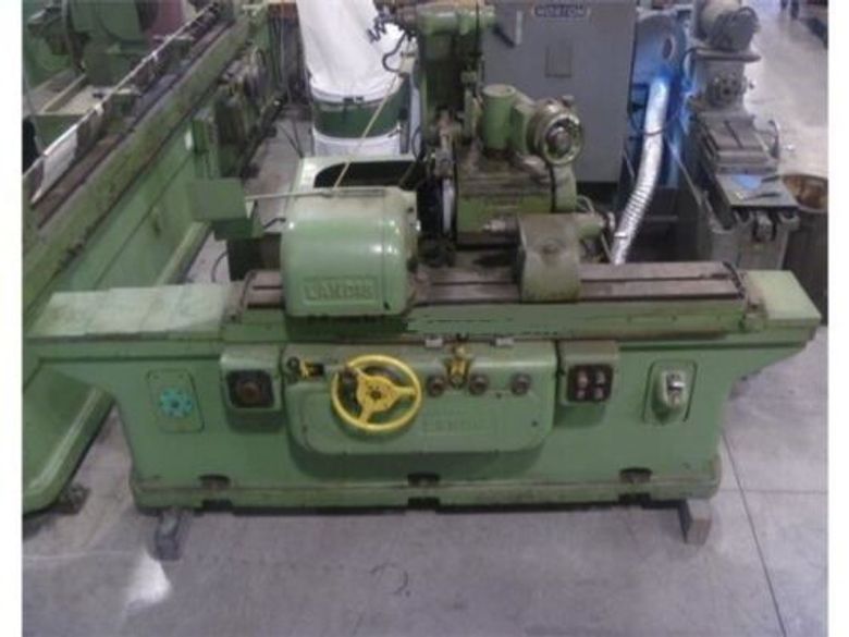EQUIPPED WITH SWING DOWN ID HEAD, TABLE SWIVELS, WORK HEAD SWIVELS, WHEEL HEAD SWIVELS
