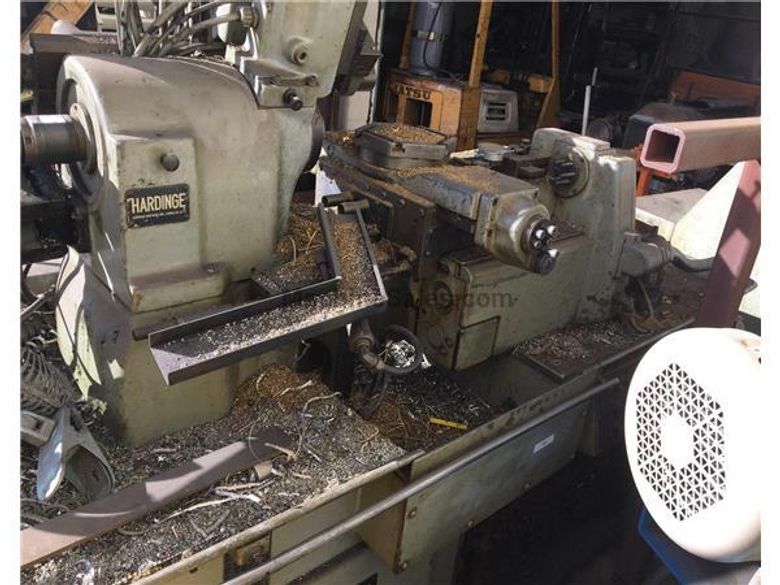 equipped with 5C COLLET, LOTS OF TOOLING, BAR FEEDER