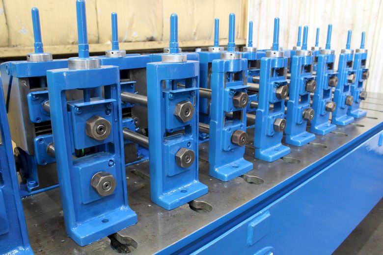 18 STAND BASE WITH (13)  YODER M-1-1/2  ROLLFORMER: STOCK #72174
