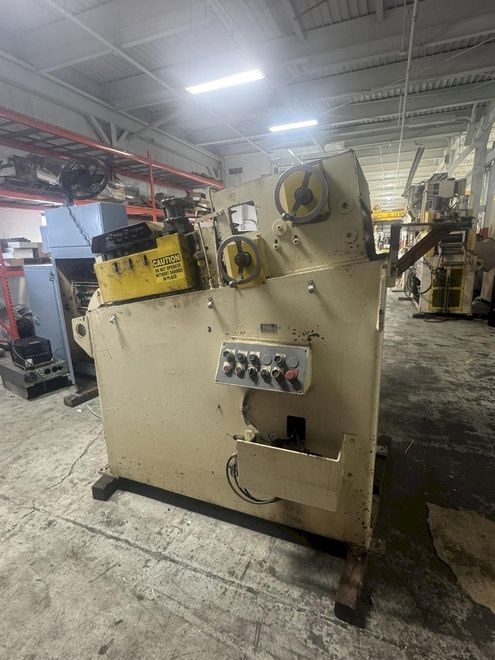 8,000 lbs. x 18" Perfecto Pull Off Reel and Powered Straightener