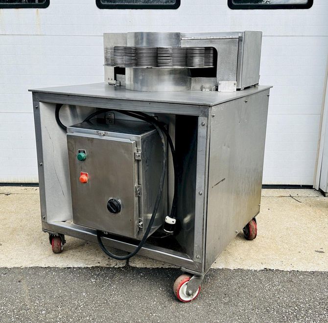 Urschel Laboratories Inc.  |  10 Station Semi-Automatic Rotating Onion Slicer