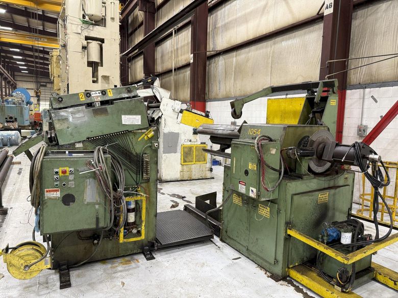 15,000 lbs. x 24" wide Feed Lease Coil Reel with Feed Lease Powered Straightener For Sale - Mode