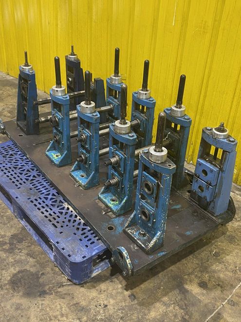4 STAND X 1.5" X 11" YODER ROLLFORMER STANDS ON 6 STAND RAFTED BASE: STOCK #16781