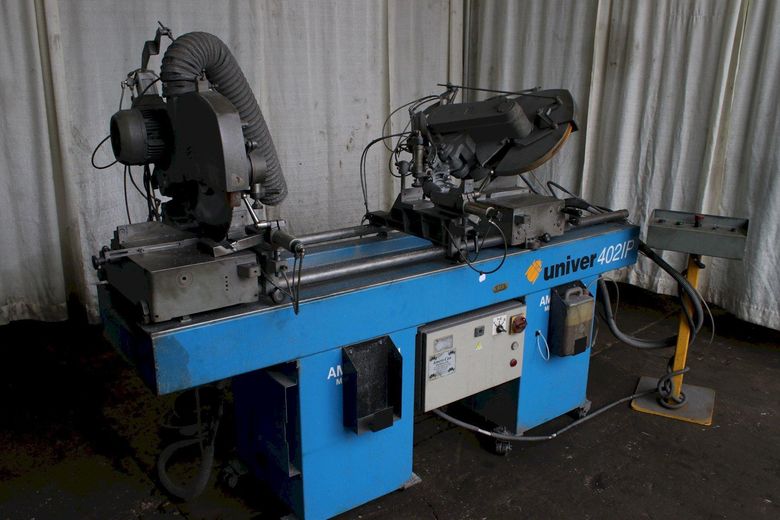 PERTICI UNIVER 402IP DOUBLE HEAD TRAVELING MITER SAW: STOCK #75312