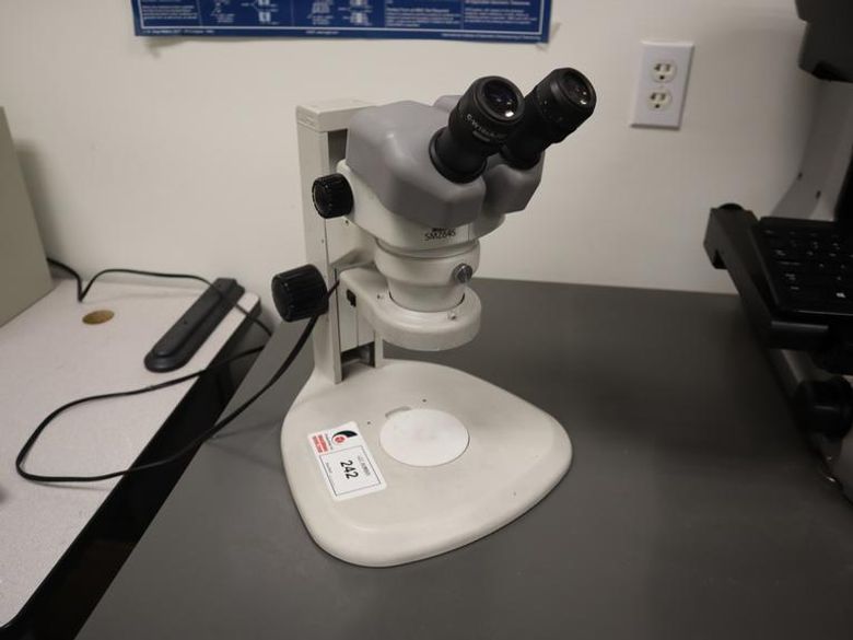 Nikon SMZ645 Stereo Zoom Microscope with Light Ring, .8-5X Zoom, 10X Eyepiece Lenses- Auction Item