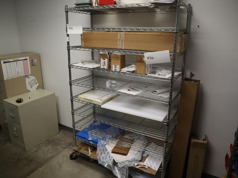 Rolling Adjustable Shelf Wire Racking with 10 Shelves and Contents- Auction Item