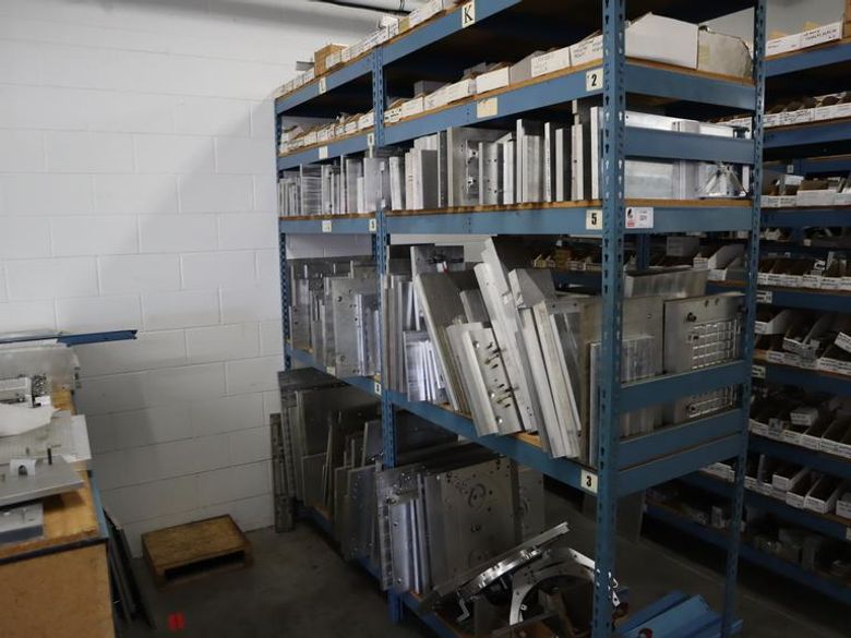 Teardrop Style Racking (2) 4' Sections, (10) Shelves,  with Contents of Mostly Aluminum Fixture Plates with Steel Hardware- Auction Item