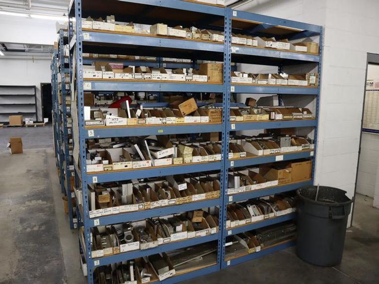 Teardrop Style Racking (2) 4' Sections, (16) Shelves,  with Contents of Mostly Aluminum Fixture Plates with Steel Hardware- Auction Item