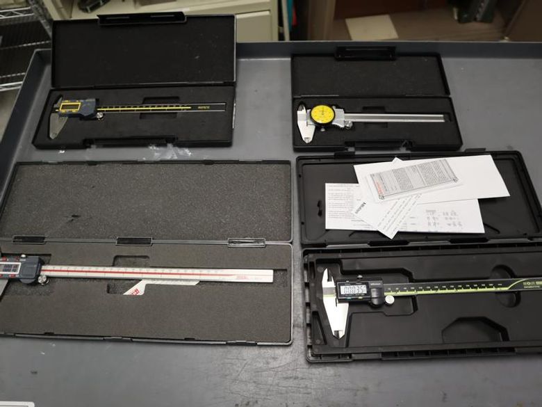 Digital Micrometers (1) 8" Asimeto, (1) 8" Mitutoyo, (1) 12" SPI, and (1) 6" Asimeto Dial Caliper- Auction Item