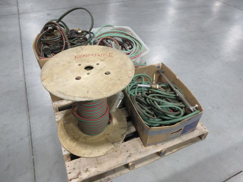 Oxy/Acetylene Torch Parts, Gas Valves, and Partial Spool of New Tubing on Pallet- Auction Item
