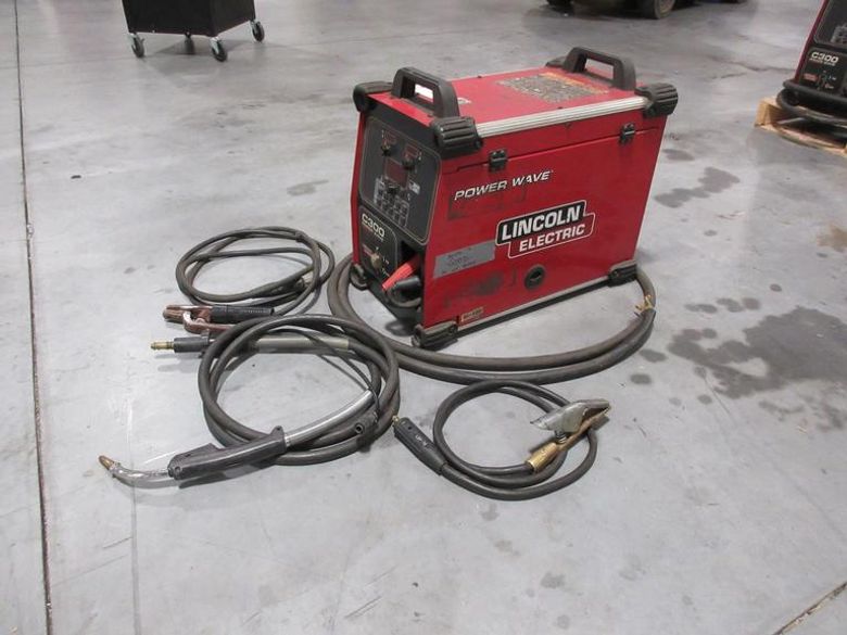 Lincoln Electric Power Wave C300 multi-process power source with an integrated wire feeder- Auction Item