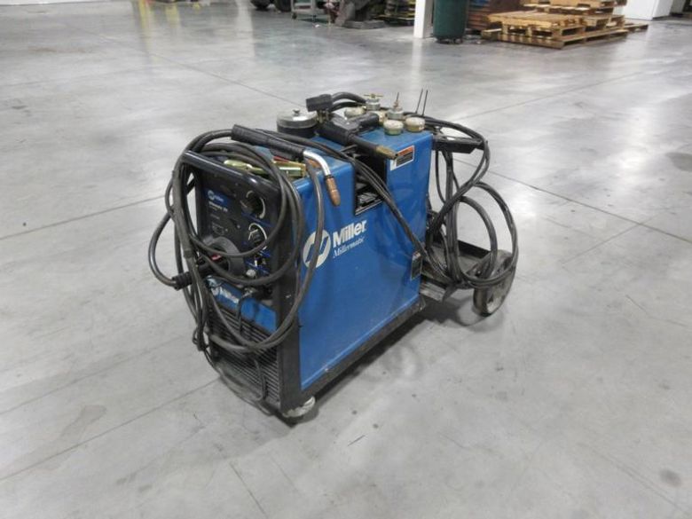 Millermatic 251 MIG Wire Feed Welder with Rolling Base and Accessories, 200/230V Single Phase- Auction Item