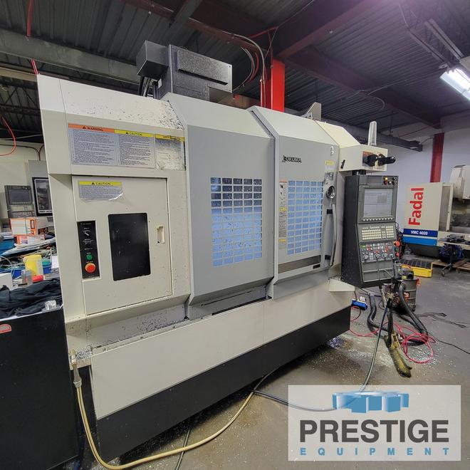Okuma Genos M560-V, X-41", Y-22", OSP-300M, 32 ATC, Part/Tool Probe, 4th Axis Table, Chip Blaser, 2015, #43983