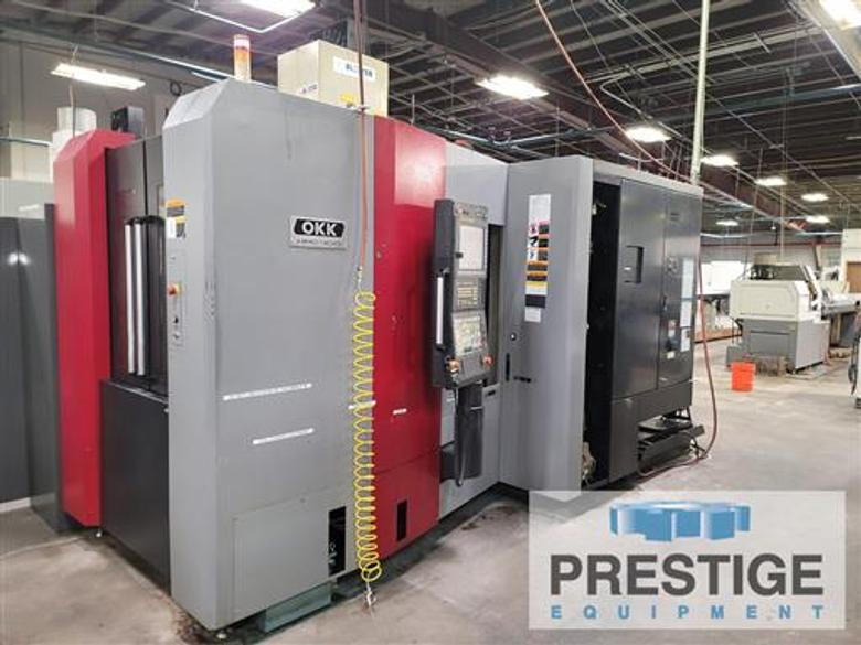 OKK HMC400, Fanuc 31i-B, X-22", Y-22", Z-27", 15.7" Pallets, B-Axis, 60 ATC, 15K RPM, TSC, Chip Conv, 2015, #32909