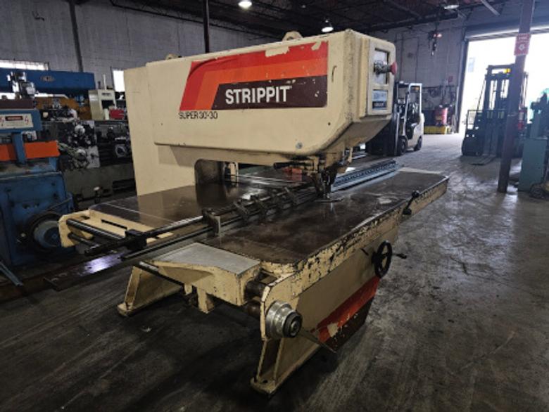 30 Ton, STRIPPIT, #3030, 1-1/4" & 3-1/2" holders, gauging, tooling, 1990   Our stock number: 7195