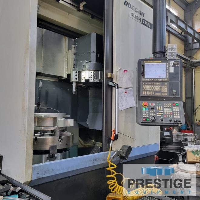 Doosan Puma V8300R, 32.67" Cutting Diameter, 15" Chuck, 2,000 RPM, 12 Pos. Turret, Fanuc i, Chip Conveyor, 2019,  #43184