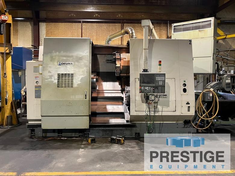 OKUMA Impact LU45 4-Axis, OSP-200L, Upper/Lower Turret, 24" 3-Jaw Chuck, Hyd. Tailstock, Chip Conveyor, Low Hours #32617
