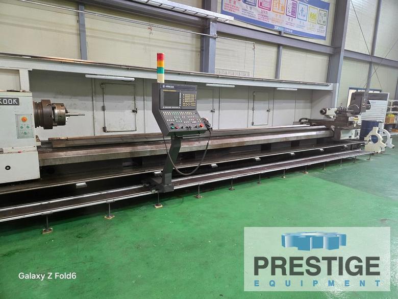 Hankook Hanturn-75 x 6000, 29.5" swing, 236" cc, 1,250 RPM, Fanuc 21i CNC, 24 HP, (2) Steadies, (2) Chucks, 2012, #44023