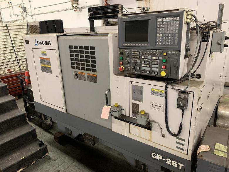 OKUMA GP-26T CNC CYLINDRICAL GRINDER, NEW 2007, 24" DIA WHEEL, 25.6" CENTER DISTANCE SHOULDER GAUGE, COOLANT, OSP U10G CNC CONTROL