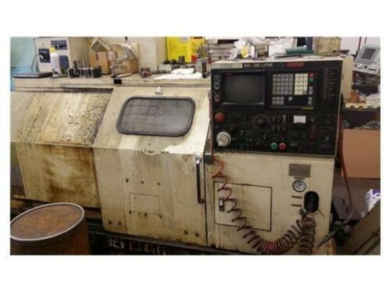 EQUIPPED WITH 4-AXIS, 22X60, FANUC 11TT, 4' SPINDLE HOLE, 15" CHUCK, COLLET HEAD, 60 HP, 3200 RPM, UNDER POWER & RUNNING