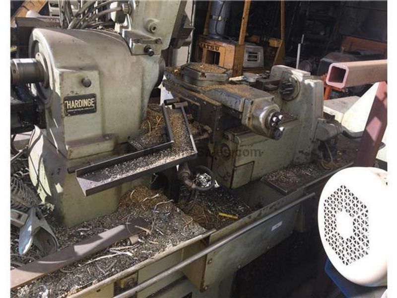 equipped with 5C COLLET, LOTS OF TOOLING, BAR FEEDER